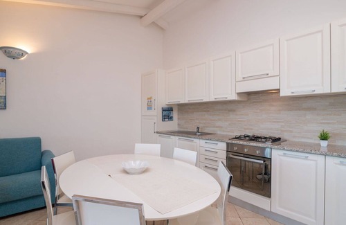 Porto Pozzo Apartment | Nice apartment for 6 guests with WIFI, pool, A/C, terrace, pets allowed and parking