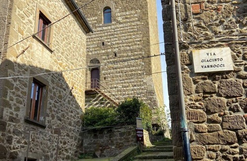 Montecatini Val di Cecina House | Nice apartment in villa for 6 guests with A/C, pool, WIFI, TV, patio, pets allowed and parking