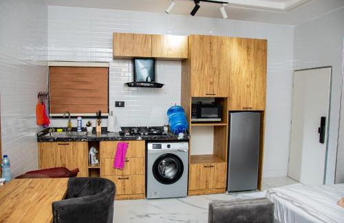 Abuja Apartment | NIFEWAT APARTMENT,Dijon studio apartment with pool,WiFi, gym,Netflix and sit out area
