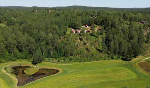 Arjang Resort | Noretjärns Stugby