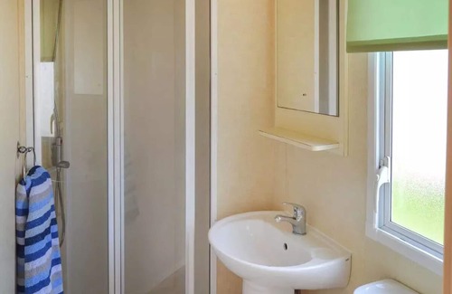 Bacton House | Norfolk Lavender Caravan - Sleeps 4 with Free WiFi and SKY TV.