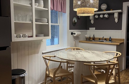 Laurium Cottage | NORTHERN LIGHTS! Historic Storybook Beach Cottage at Tamarack Waterworks