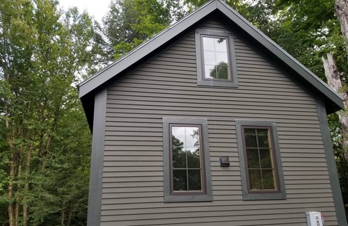 Craftsbury Cabin | Northwoods Guest Cabin and firepit & porch overlooking private woods and stream