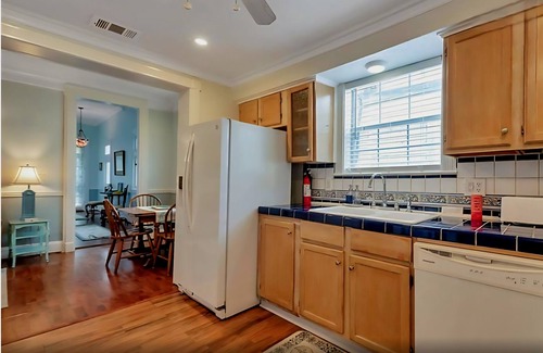 San Jacinto Cottage | Notable Galveston Cottage just steps to Seawall Beaches, Sunrises & Attractions.