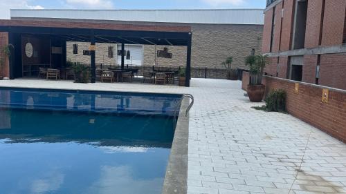 Zapopan Apartment | Nuevo Departamento Céntrico con Alberca y Parking
