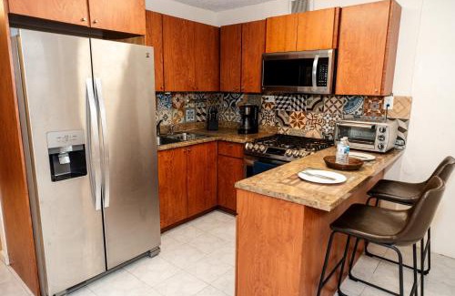 Bucana Apartment | Oasis in the South of the Island with FREE parking and laundry
