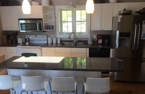 Surry House | Ocean-Beach Front Cottage on Blue Hill Bay w/Mt Desert Island on the Horizon.
