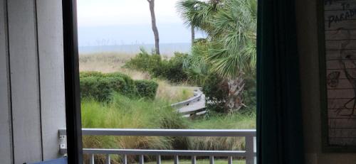 Hilton Head Island Apartment | Ocean Dunes Villas #111, Beach Condo in Coligny Beach, 43 S Forest Beach Dr, Hilton Head SC, Oceanfront condo, Heated Pool, By Vacation Rental HHI