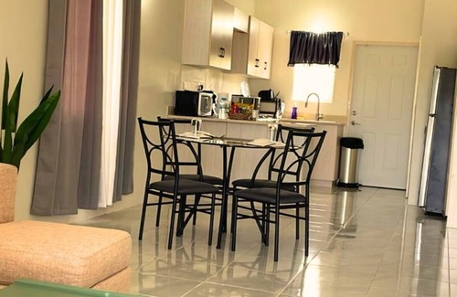 Discovery Bay Villa | Ocean View 2-bedroom villa with AC, WiFi in Discovery Bay Beach/Pool Access