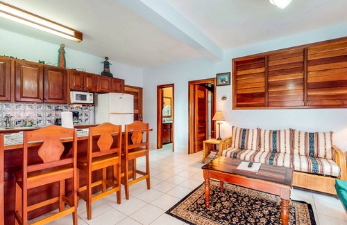 San Pedro Condo | Ocean-view apartment in a beachfront resort with shared pool, WiFi & partial AC