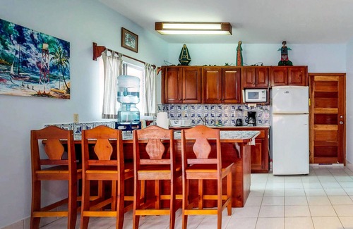 San Pedro Condo | Ocean-view apartment in a beachfront resort with shared pool, WiFi & partial AC