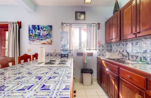San Pedro Condo | Ocean-view apartment in a beachfront resort with shared pool, WiFi & partial AC