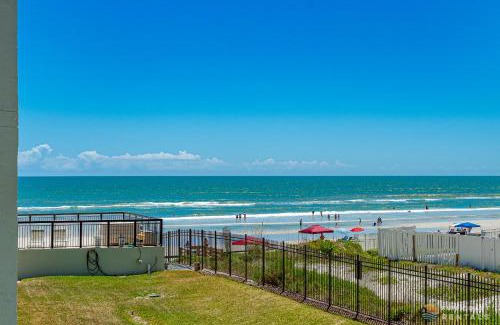 New Smyrna Beach Apartment | Ocean View Balcony just STEPS to the Beach with Pool, Parking and Wi-Fi!