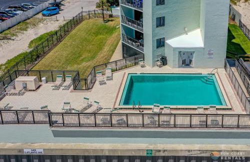 New Smyrna Beach Apartment | Ocean View Balcony just STEPS to the Beach with Pool, Parking and Wi-Fi!