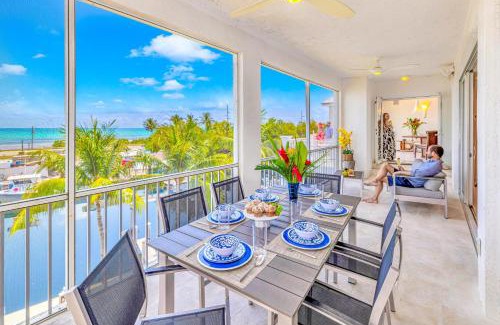 Islamorada Apartment | Ocean View Duplex Penthouse Retreat amenities: tennis court heated Pool Vista Key One