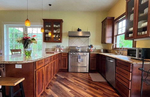 Pahoa House | Ocean View Estate with private hiking trail and volcanically heated hot tubs.