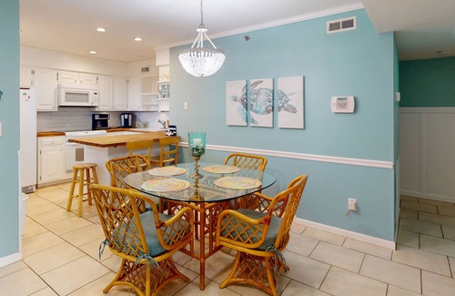 Sneads Ferry Condo | Ocean-view condo with elevator, balcony, W/D, community outdoor pool & grills