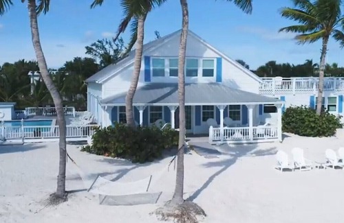 Islamorada House | Oceanfront 165ft beach-Dock-Heated pool-4K sq.ft 4 bed/5 bath-Next avail 8.9.25