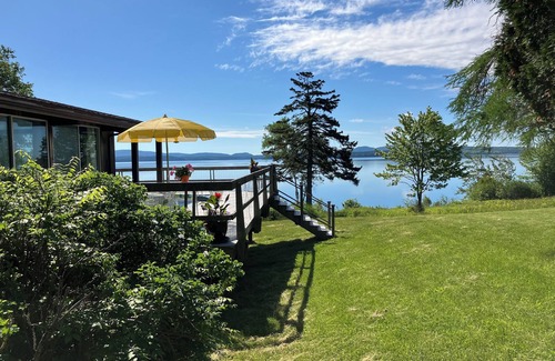 Surry House | Oceanfront 1980's Contemporary . Serene. Pet friendly. Private beach. Sleeps 4.