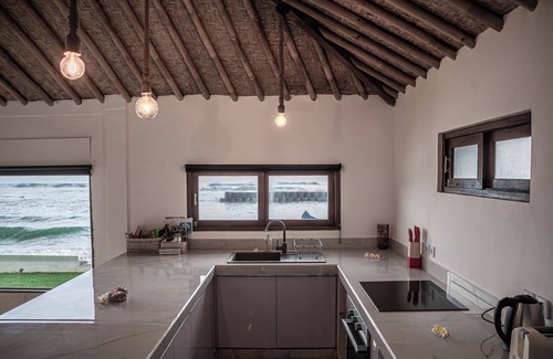 Candi Dasa Villa | Oceanfront 2BR Luxe Infinity Pool Marble Bath Villa Nautilus