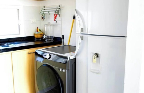 Playas Apartment | Oceanfront apartment, swimming pool, automatic check-in