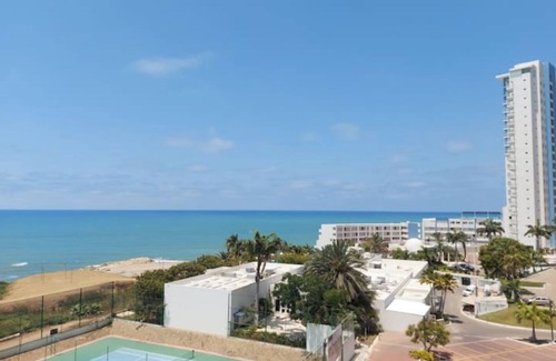 Playas Apartment | Oceanfront apartment, swimming pool, automatic check-in