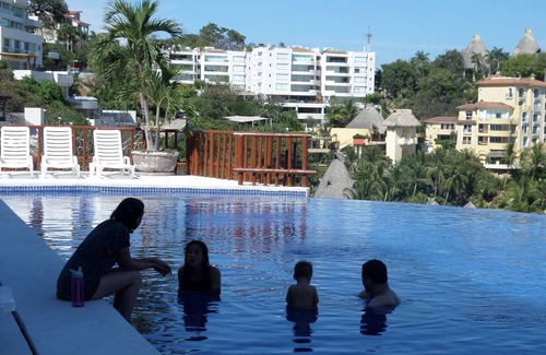 Puerto Marques Apartment | Oceanfront apartment. Great service. Beautiful private terrace with pool