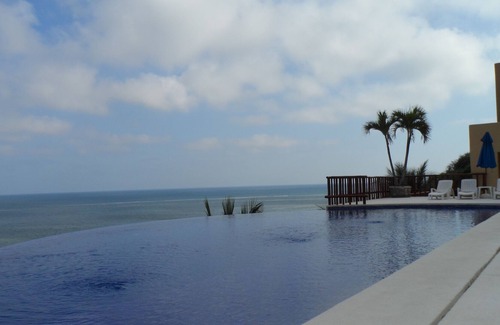 Puerto Marques Apartment | Oceanfront apartment. Great service. Beautiful private terrace with pool
