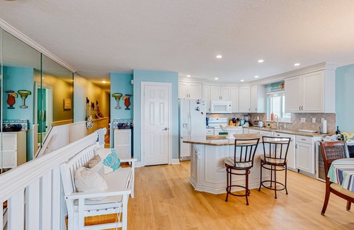 Ponce Inlet House | Oceanfront condo with scenic balconies, pool, beach gear, & W/D - dog-friendly