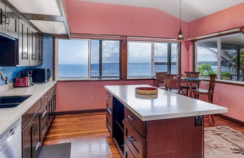 Keaau House | Oceanfront home with private hot tub, wraparound deck, ocean views, W/D & lanai