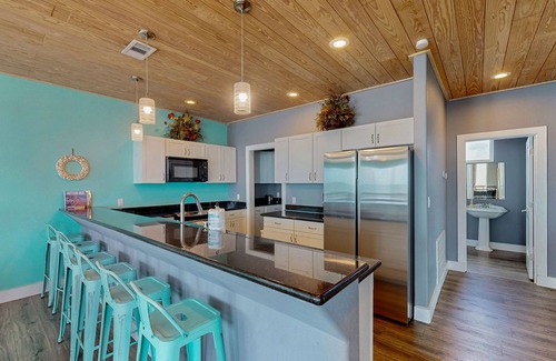 Gilchrist House | Oceanfront home with balconies, fireplace & views - steps from the beach