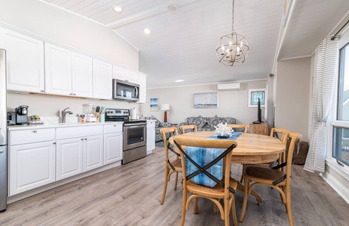 North Truro House | Oceanfront hotel suite at beachfront Sandbars Inn with balcony, AC & firepit