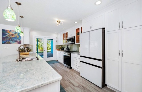 Port Canaveral House | Oceanfront Oasis: Private Pool, Hot Tub , Arcade Fun & Pool Table Retreat!