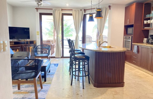 Majahual Apartment | Oceanfront penthouse with private rooftop, pool and bbq area