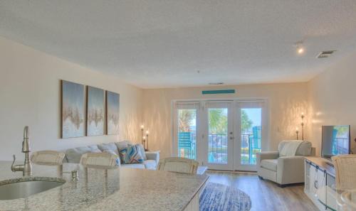 North Topsail Beach House | Oceanfront Resort with Pools - Onsite Restaurant - Premier Condo