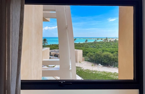Telchac Puerto Apartment | Oceanfront Studio with a Pool, WIFI, Central A/C, Great Location