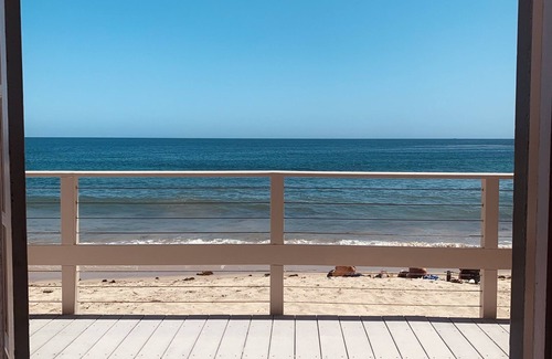 Los Angeles County House | Oceanfront Vintage Malibu Beach Bungalow at the beach with large OceanFront Deck