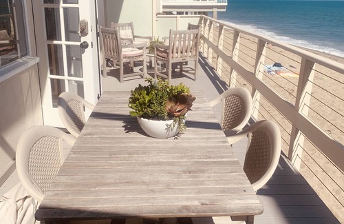 Los Angeles County House | Oceanfront Vintage Malibu Beach Bungalow at the beach with large OceanFront Deck