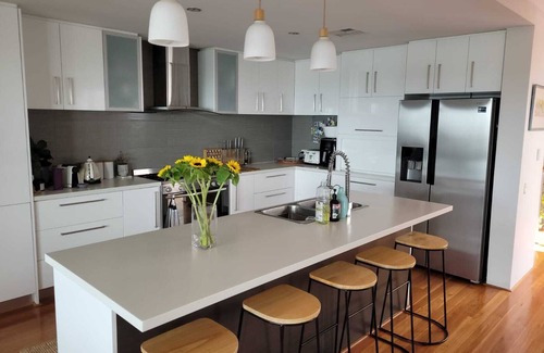 Mullaloo House | Oceanview sunsets over the wonderful Mullaloo Beach and heated outdoor pool.