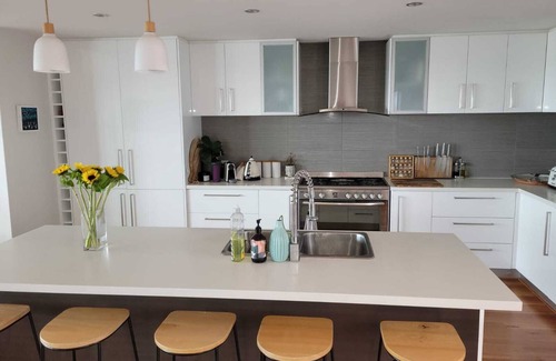 Mullaloo House | Oceanview sunsets over the wonderful Mullaloo Beach and heated outdoor pool.