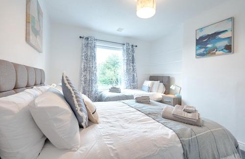 Cockett House | Off Road parking, Garden, TV in Every Room