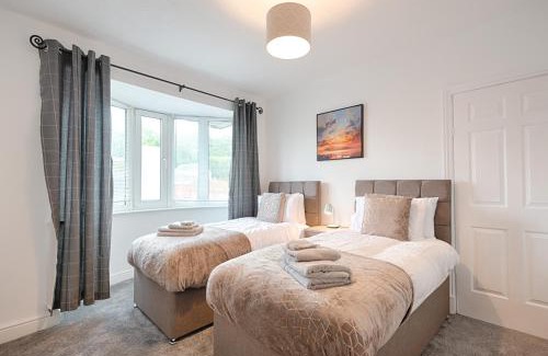 Cockett House | Off Road parking, Garden, TV in Every Room
