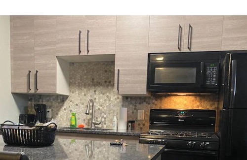 Little Italy Apartment | Off-street Parking Walk to RTA and All Restaurants