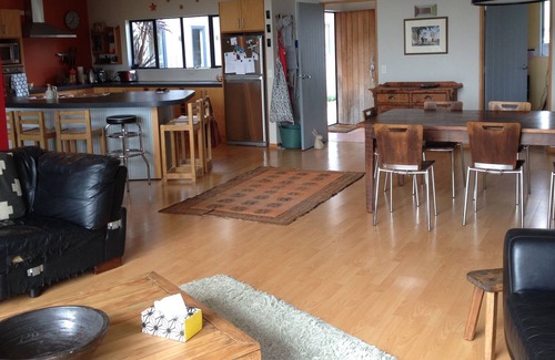 Raglan House | Okete Landing - Lifestyle retreat on Raglan harbour with grass tennis court.