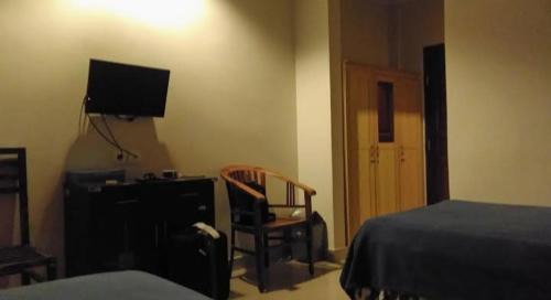 Downtown Kuta Hotel | Okie House ( Iin )