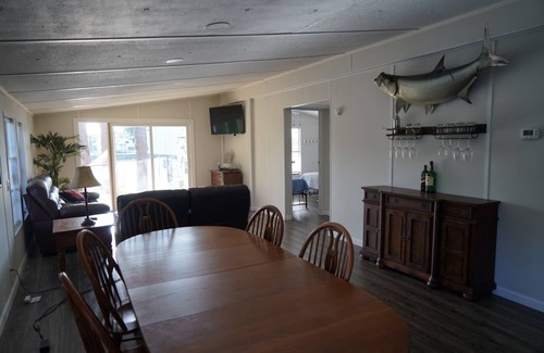 Suwannee House | Old Florida Waterfront Getaway - Large Porch, Big Dock, & Pet Friendly