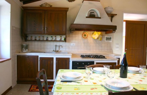 Monte San Savino Villa | Old stone farmhouse, large outdoor area with paved terrace equipped with garden furniture. Quiet and