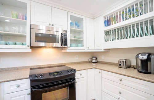 Old Town Cottage | Old Town Elegance with Island Breezes and Poolside Bliss