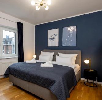 Wiesdorf Apartment | OLIVE Apartments - 2x Kingsize Betten - sehr zentral