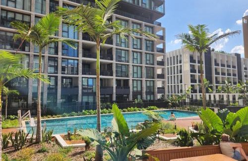 Lidcombe Apartment | Olympic Park 2BR Pool gym access and walk to stadium